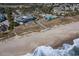 Aerial view of coastal community with private beach access and clubhouse at 487 Lantana Circle, Georgetown, SC 29440