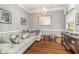 Cozy living room with hardwood floors, stylish furniture, and a charming ambiance at 487 Lantana Circle, Georgetown, SC 29440