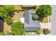 Aerial shot shows the home's roof, landscaping, and proximity to nearby streets and foliage at 5036 Billy K Trail, Myrtle Beach, SC 29579