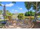 Serene backyard fire pit area with chairs, providing a tranquil setting by the water for relaxation at 5036 Billy K Trail, Myrtle Beach, SC 29579