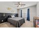 Bedroom featuring neutral carpet, small desk, and large window with blinds at 5036 Billy K Trail, Myrtle Beach, SC 29579