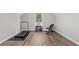 Spacious bonus room for a home gym, with wood floors and natural light at 5036 Billy K Trail, Myrtle Beach, SC 29579