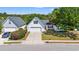 Charming home with a well-manicured lawn, attached garage and inviting curb appeal in a suburban neighborhood at 5036 Billy K Trail, Myrtle Beach, SC 29579