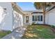 Inviting entrance featuring a glass storm door and a well-manicured flower bed at 5036 Billy K Trail, Myrtle Beach, SC 29579