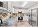 Modern kitchen featuring granite countertops, stainless steel appliances, and ample cabinet space at 5036 Billy K Trail, Myrtle Beach, SC 29579