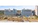 Aerial view of condo buildings with beach access, swimming pools and playgrounds at 5200 N Ocean Blvd. # 833, Myrtle Beach, SC 29577