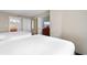 Bright bedroom featuring two beds with dresser and TV with a connecting bathroom at 5200 N Ocean Blvd. # 833, Myrtle Beach, SC 29577
