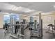 Well-equipped fitness center with various exercise machines and natural light at 5200 N Ocean Blvd. # 833, Myrtle Beach, SC 29577