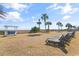 Relaxing outdoor lounge area with beach access and covered swing at 5200 N Ocean Blvd. # 833, Myrtle Beach, SC 29577