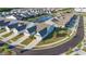 Aerial view of a community with a pond and well-manicured lawns at 5876 Cremona Dr., Myrtle Beach, SC 29577