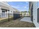 Backyard with a black fence and a patio at 5876 Cremona Dr., Myrtle Beach, SC 29577