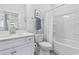 Clean and bright bathroom featuring a single vanity, toilet, and shower with tub combination at 5876 Cremona Dr., Myrtle Beach, SC 29577