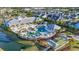 Aerial view of a luxurious community pool and clubhouse, with ample seating and recreational areas at 5876 Cremona Dr., Myrtle Beach, SC 29577
