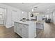 Spacious kitchen island with granite countertop, open to the living and dining areas at 5876 Cremona Dr., Myrtle Beach, SC 29577