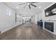Bright open-concept living room with a view into the modern kitchen and dining area at 5876 Cremona Dr., Myrtle Beach, SC 29577