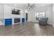 Cozy living room with shiplap fireplace, modern furniture, and natural light at 5876 Cremona Dr., Myrtle Beach, SC 29577