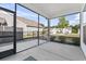 Screened-in patio with views of the backyard and neighboring homes at 5876 Cremona Dr., Myrtle Beach, SC 29577