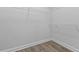Walk-in closet with wooden floors and wire shelving at 5876 Cremona Dr., Myrtle Beach, SC 29577