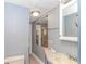 Well-lit bathroom with a mirrored wall, vanity, and neutral-toned tile flooring for a practical space at 6001-5610 S Kings Hwy., Myrtle Beach, SC 29575