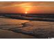 Scenic beach with sunset over ocean at 6001-5610 S Kings Hwy., Myrtle Beach, SC 29575