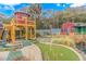Charming mini golf course with green turf, water features, and whimsical structures for Gathering fun at 6001-5610 S Kings Hwy., Myrtle Beach, SC 29575