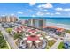Aerial view of a resort with multi-story buildings and blue ocean view at 603 S Ocean Blvd. # 1101, North Myrtle Beach, SC 29582