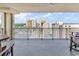 Relaxing balcony with seating and views of the cityscape and blue skies at 603 S Ocean Blvd. # 1101, North Myrtle Beach, SC 29582