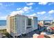 Beautiful condo building on a bright, sunny day near the ocean, with easy access to a busy street at 603 S Ocean Blvd. # 1101, North Myrtle Beach, SC 29582