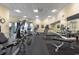 Spacious gym equipped with treadmills, ellipticals, weight machines, benches, and wall mirrors at 603 S Ocean Blvd. # 1101, North Myrtle Beach, SC 29582
