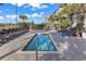 Hot tub with lounge chairs around and views of palm trees at 603 S Ocean Blvd. # 1101, North Myrtle Beach, SC 29582
