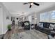 Bright, open-concept living room with stylish decor, hardwood floors, and plenty of natural light at 603 S Ocean Blvd. # 1101, North Myrtle Beach, SC 29582