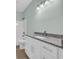 The bathroom has granite countertops and a shower-tub combo at 604 Highway 747, Loris, SC 29569