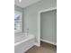 Bright bathroom showcasing a white soaking tub, and window at 604 Highway 747, Loris, SC 29569