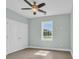 This bedroom offers natural light with a neutral color and ceiling fan at 604 Highway 747, Loris, SC 29569