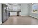 Modern kitchen with stainless steel appliances, white cabinets, and ample counter space at 604 Highway 747, Loris, SC 29569