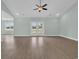 Spacious living area featuring wood-look floors and access to the backyard at 604 Highway 747, Loris, SC 29569