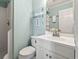 Freshly updated bathroom with a white vanity, new fixtures, and a walk-in shower at 609 Hillside Dr. S # C-16, North Myrtle Beach, SC 29582