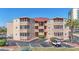Attractive condo complex with multiple balconies, well maintained landscaping, and ample parking spaces at 609 Hillside Dr. S # C-16, North Myrtle Beach, SC 29582