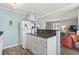 Open concept kitchen with white cabinets, granite countertops, and stainless steel appliances at 609 Hillside Dr. S # C-16, North Myrtle Beach, SC 29582