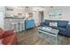 Inviting living room with comfortable seating and coastal-themed decor, adjacent to the kitchen at 609 Hillside Dr. S # C-16, North Myrtle Beach, SC 29582