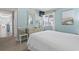 Bright and airy main bedroom features a comfortable bed and dresser at 609 Hillside Dr. S # C-16, North Myrtle Beach, SC 29582