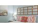 Close up of the main bedroom features a decorative headboard and coastal themed decor at 609 Hillside Dr. S # C-16, North Myrtle Beach, SC 29582