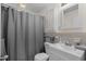 This bathroom features a toilet, vanity, mirror, and a shower with curtain at 617 Hibiscus Ave. # 617, Myrtle Beach, SC 29577