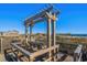Scenic wooden swing set on a deck overlooking the beach and ocean, perfect for relaxation at 617 Hibiscus Ave. # 617, Myrtle Beach, SC 29577