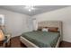 This bedroom features hardwood floors and a neutral color palette at 617 Hibiscus Ave. # 617, Myrtle Beach, SC 29577
