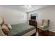 This bedroom features a ceiling fan, a large window, and a full-sized bed at 617 Hibiscus Ave. # 617, Myrtle Beach, SC 29577