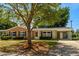 Charming single-story home featuring a brick facade, well-maintained landscaping, and a convenient carport at 617 Hibiscus Ave. # 617, Myrtle Beach, SC 29577