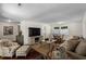 Spacious living area featuring hardwood floors, a comfortable seating arrangement, and a view into dining area at 617 Hibiscus Ave. # 617, Myrtle Beach, SC 29577