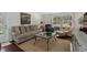 Inviting living room featuring hardwood floors, a large window, and cozy seating perfect for relaxation at 617 Hibiscus Ave. # 617, Myrtle Beach, SC 29577