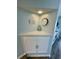 Corner nook featuring a built-in cabinet, decorative items, and an adjacent kitchen space at 625 North Waccamaw Dr. # 101, Murrells Inlet, SC 29576